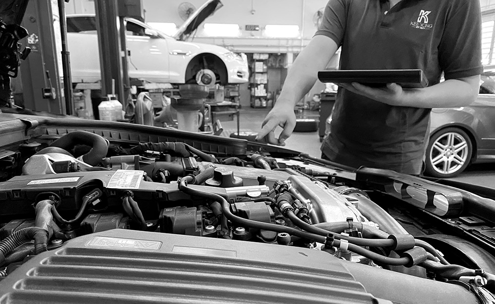 A Man Checking The Engine's Condition