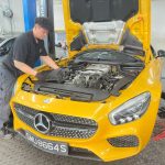 yellow mercedes servicing